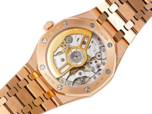Back view of the Royal Oak Pink Gold 41mm watch, showcasing its intricate mechanical movement and pink gold bracelet.