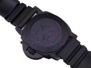 Rear view of Luminor Submersible 47 Marina Militare ‘Carbotech’ watch showcasing the engraved carbon case and rubber strap.