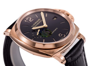Luminor Due 38 Automatic watch with Oro Rosso red gold case, black dial, and black leather strap, shown at an angle.