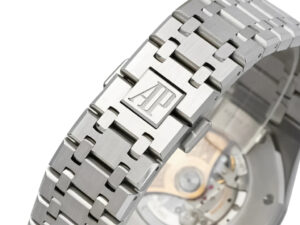 Royal Oak Stainless Steel (41mm) - Close-up of the watch bracelet with AP logo and partially visible mechanical movement.