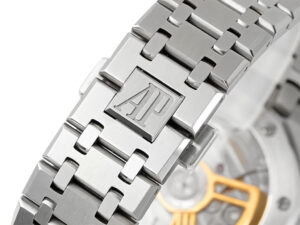 Close-up of the Royal Oak Stainless Steel watch bracelet showcasing the AP logo and part of the visible movement.