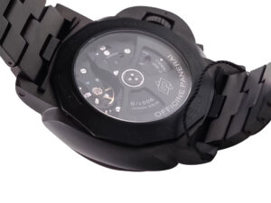 Close-up of the back view of Luminor 1950 3 Days GMT Automatic ‘Tuttonero’ showing black ceramic case, bracelet, & movement.