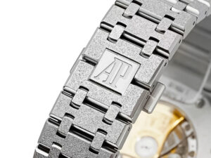 Close-up of the Royal Oak Frosted Stainless Steel bracelet showcasing its textured finish and engraved AP logo, 41mm model.