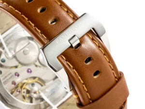 Close-up of the Luminor Marina's brown leather strap with stainless steel clasp, showcasing stitching and clear back case.