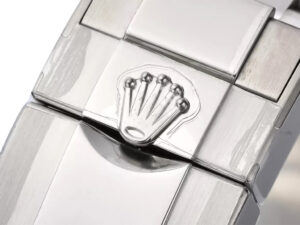 Close-up of the clasp on the Cosmograph Daytona Stainless Steel ‘Panda’ (2023) featuring an engraved crown logo.