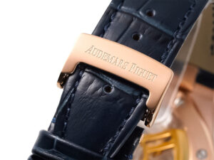 Close-up of the Royal Oak Pink Gold '50th Anniversary' watch's blue leather strap with a pink gold Audemars Piguet clasp.