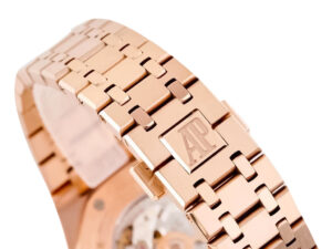 Royal Oak ‘Perpetual Calendar’ Pink Gold watch bracelet with signature AP logo on clasp, shown in close-up.