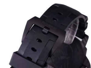 Close-up of the black rubber strap and matte buckle of the Luminor Submersible 47 Marina Militare 'Carbotech' watch.