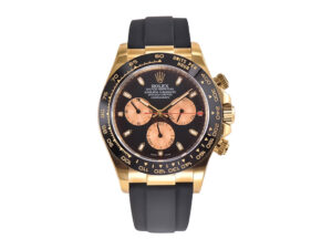 Cosmograph Daytona Yellow Gold Oysterflex with Black and Champagne Dial, featuring a black bezel and rubber strap.