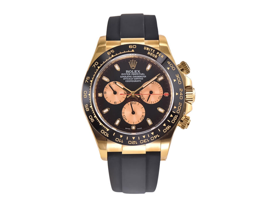 Cosmograph Daytona Yellow Gold Oysterflex with Black and Champagne Dial, featuring a black bezel and rubber strap.