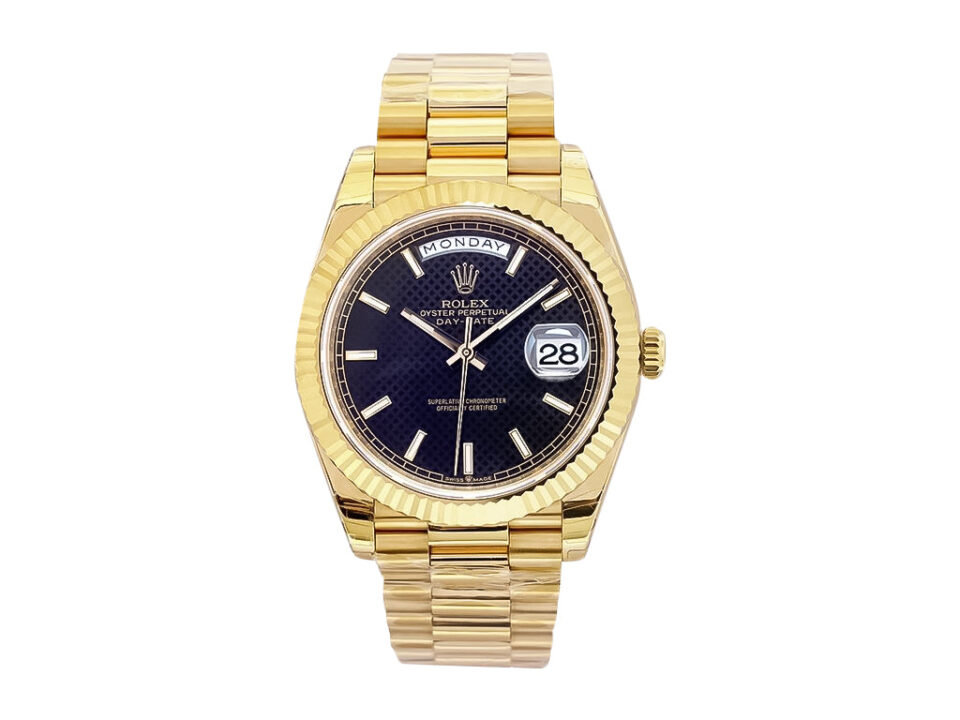 Day-Date 40 Yellow Gold 'President' watch with black motif dial, fluted bezel, and signature bracelet displayed front view.