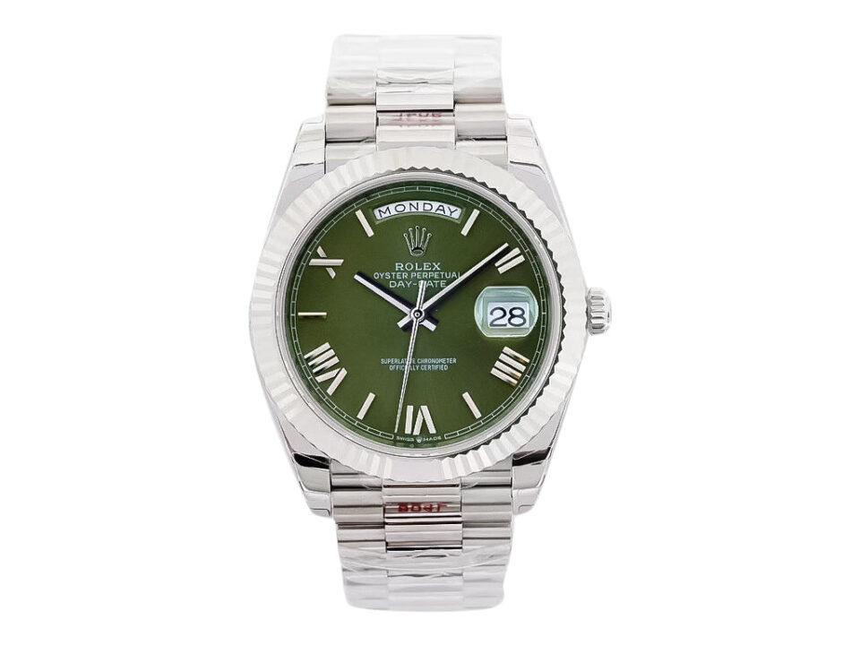 Day-Date 40 White Gold 'President' watch with green Roman numeral dial, fluted bezel, and polished bracelet.