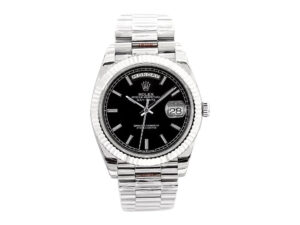 Day-Date 40 White Gold ‘President’ watch with black dial, fluted bezel, and silver bracelet displayed front-facing.