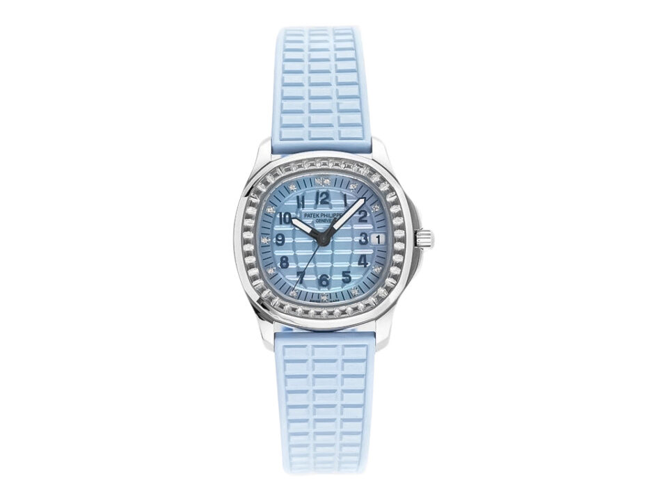 Aquanaut Luce Stainless Steel Diamond Blue watch with light blue strap, diamond bezel, and a patterned blue dial.