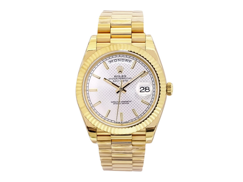 Day-Date 40 Yellow Gold 'President' with Silver Motif Dial, Fluted Bezel, and gold bracelet displayed on a white background.