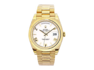 Day-Date 40 Yellow Gold 'President' watch with white Roman numeral dial, fluted bezel, and gold bracelet.