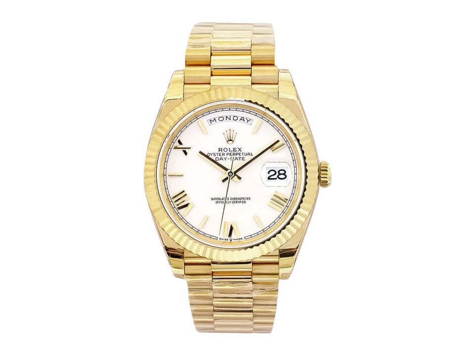 Day-Date 40 Yellow Gold 'President' watch with white Roman numeral dial, fluted bezel, and gold bracelet.