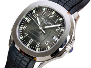 Aquanaut Stainless Steel 40mm watch with a black textured dial, luminous markers, and a black rubber strap.