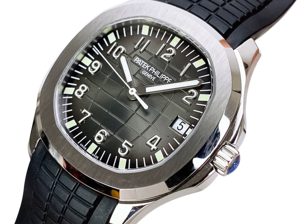 Aquanaut Stainless Steel 40mm watch with a black textured dial, luminous markers, and a black rubber strap.