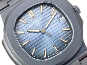 Close-up of the Nautilus 'Black Venom' Limited Edition Carbon Steel watch with a blue dial and 40mm case.