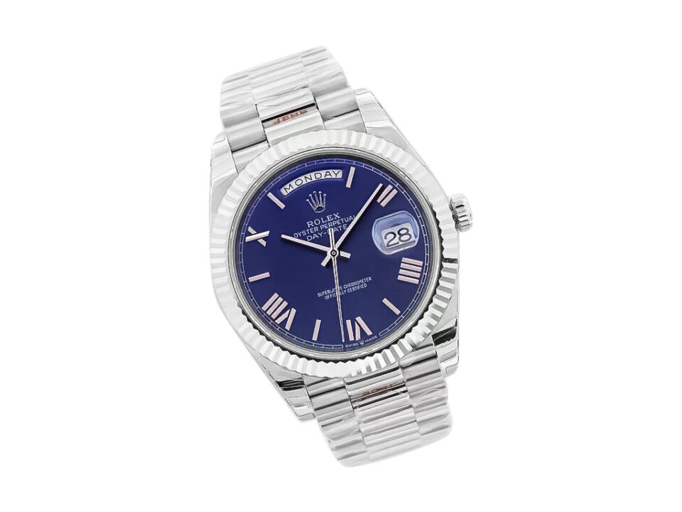 Day-Date 40 White Gold 'President' watch with blue dial, Roman numerals, and fluted bezel displayed on a product page.
