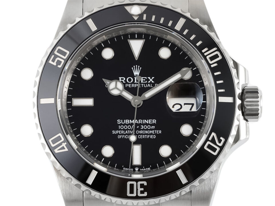 Submariner Date Stainless Steel watch with 41mm black dial, uni-directional bezel, and date display at 3 o'clock position.