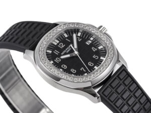 Aquanaut Luce Stainless Steel Diamond Black watch with a black patterned strap and diamond-set bezel, displayed at an angle.
