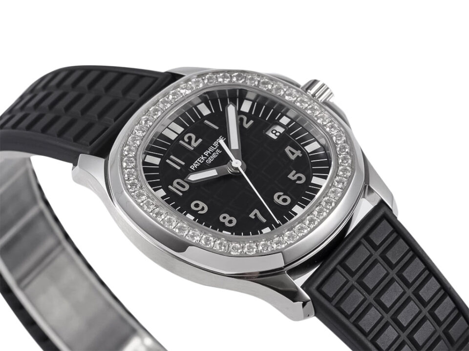 Aquanaut Luce Stainless Steel Diamond Black watch with a black patterned strap and diamond-set bezel, displayed at an angle.