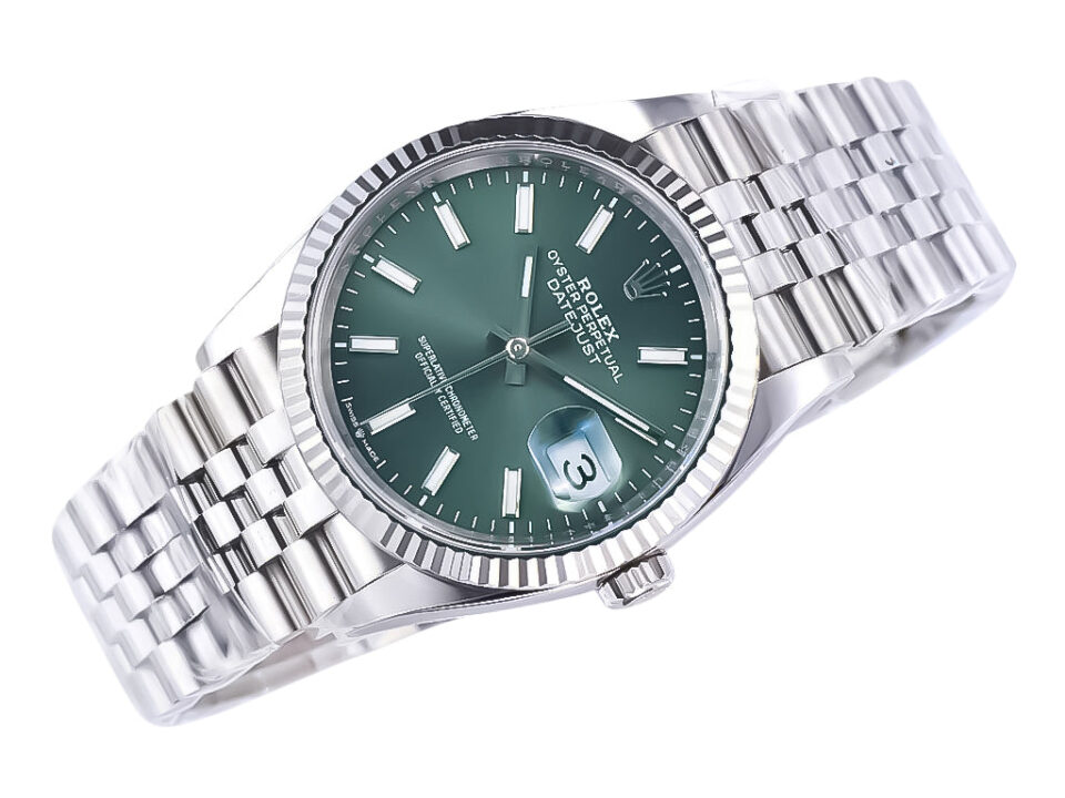 Datejust 36 Stainless Steel on Jubilee bracelet with Mint Green Dial, Fluted Bezel, and date display at 3 o'clock.