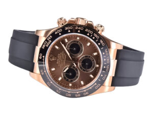 Cosmograph Daytona Rose Gold Oysterflex with Chocolate Dial featuring a luxurious design and distinct black rubber strap.