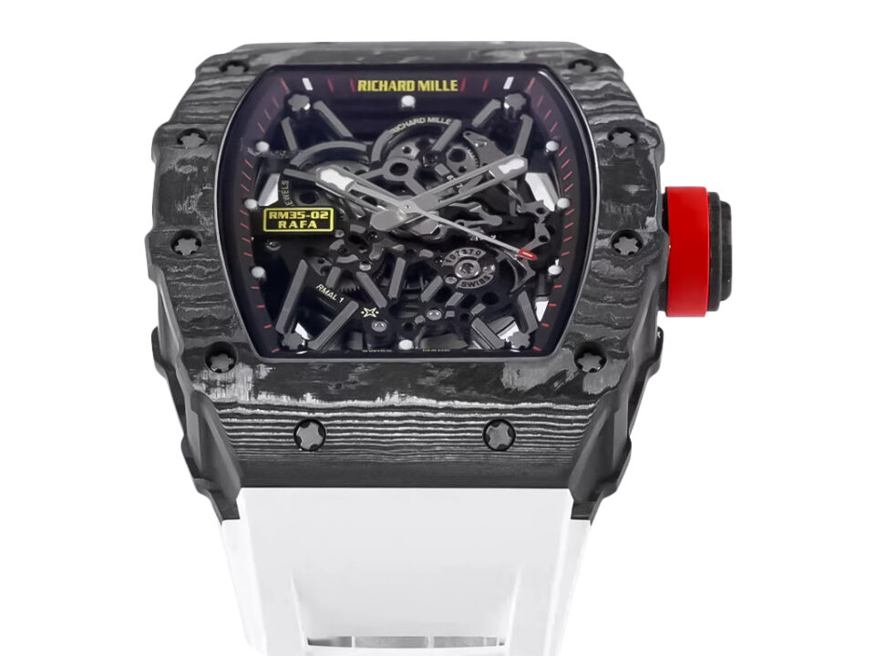 RM 35-02 Rafa watch with black bezel, red markers, white rubber strap (49mm), and an intricate exposed mechanism design.