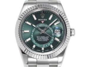 Sky-Dweller Stainless Steel watch with green dial, fluted bezel, Oyster bracelet, and date display at 3 o'clock.