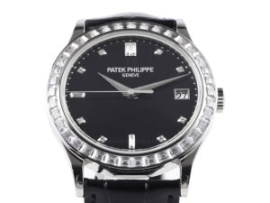 Calatrava Stainless Steel Watch with Diamond Black Dial, Diamond Bezel (38mm), and Date Display on a Black Strap.