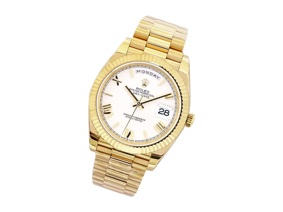 Day-Date 40 Yellow Gold ‘President’ watch with white dial, Roman numerals, fluted bezel, and gold bracelet displayed.