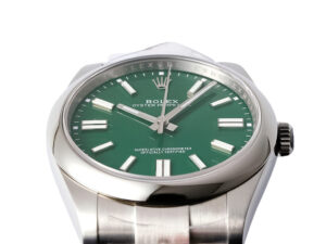 Oyster Perpetual 41 stainless steel watch with a vibrant green dial, featuring luminous hour markers and polished bezel.