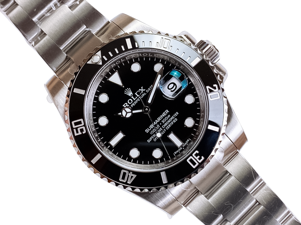 Submariner Date Stainless Steel watch with black dial, 40mm case, unidirectional bezel, and Oyster bracelet displayed flat.