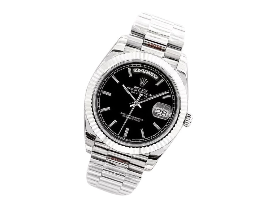 Day-Date 40 White Gold 'President' watch with black dial, fluted bezel, and signature Presidential bracelet.