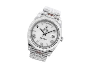 Day-Date 40 White Gold ‘President’ with white Roman numeral dial, fluted bezel, and polished bracelet displayed at an angle.