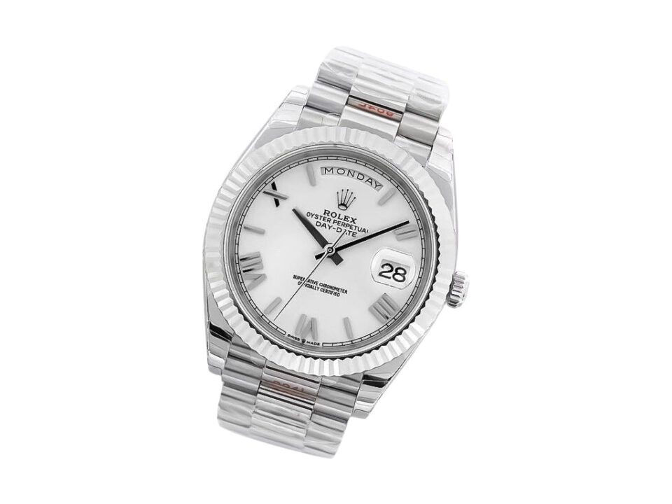 Day-Date 40 White Gold ‘President’ with white Roman numeral dial, fluted bezel, and polished bracelet displayed at an angle.