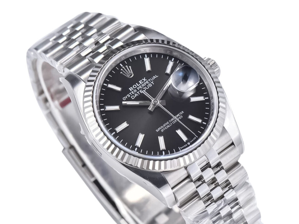 Datejust 36 Stainless Steel on Jubilee bracelet with black dial and fluted bezel, featuring a Cyclops lens over the date.