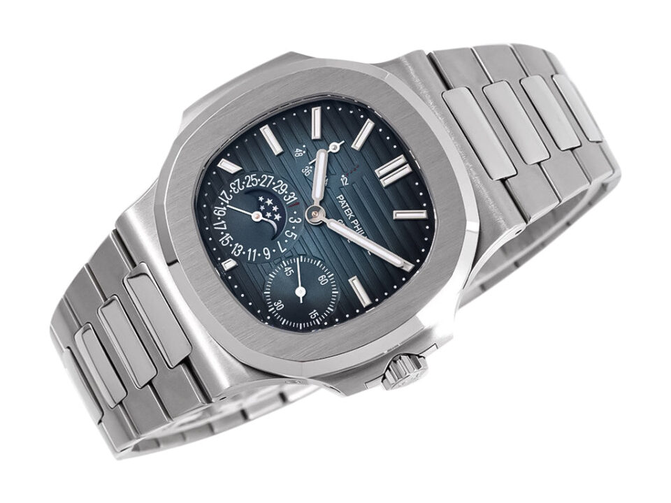 Nautilus Moonphase Stainless Steel watch with a 40mm case, blue dial, and silver bracelet displayed at an angle.