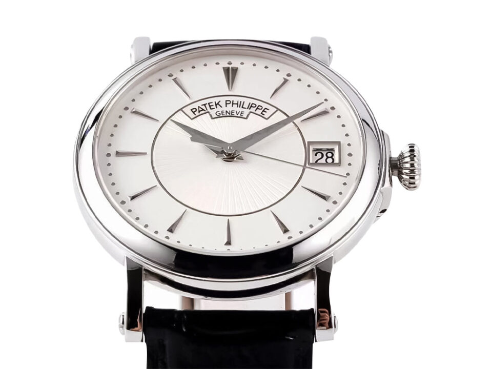 Calatrava Stainless Steel watch with 38mm silver guilloche dial, black leather strap, and date display at 3 o'clock.