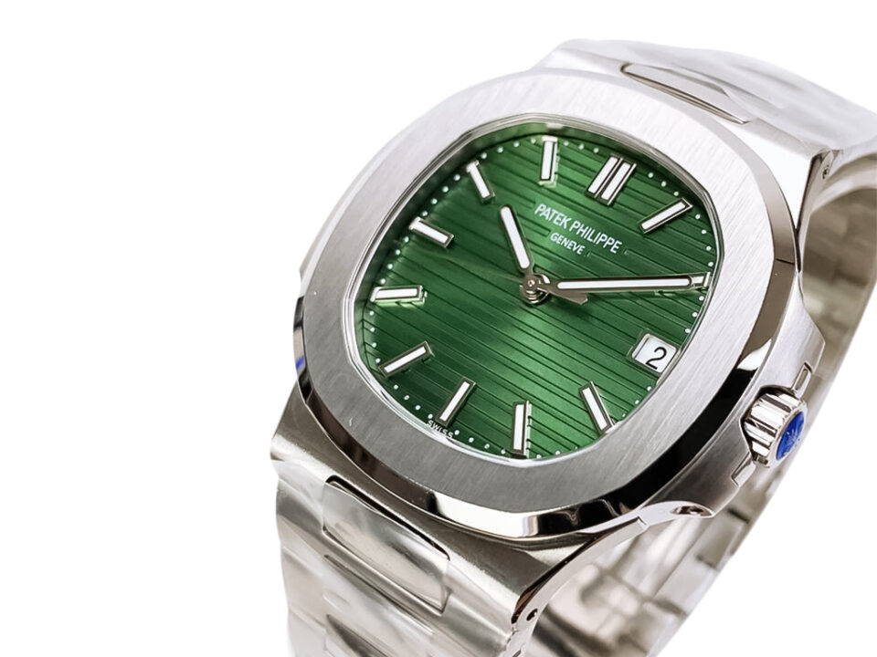 Nautilus Stainless Steel watch with 40mm case, green dial, silver hour markers, date display, and stainless steel bracelet.