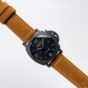 Luminor 1950 3 Days GMT Automatic Ceramica with black dial and brown leather strap, shown at an angle.