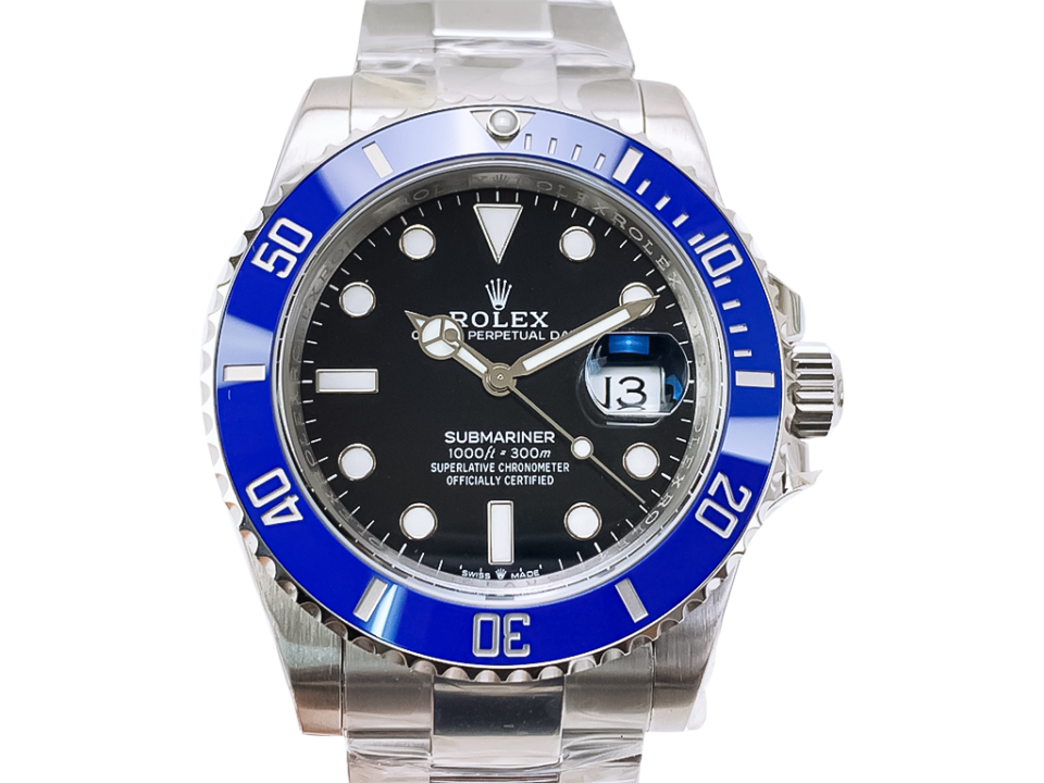 Submariner Date Stainless Steel ‘Cookie Monster’ (41mm) with a black dial, blue bezel, and stainless steel bracelet.