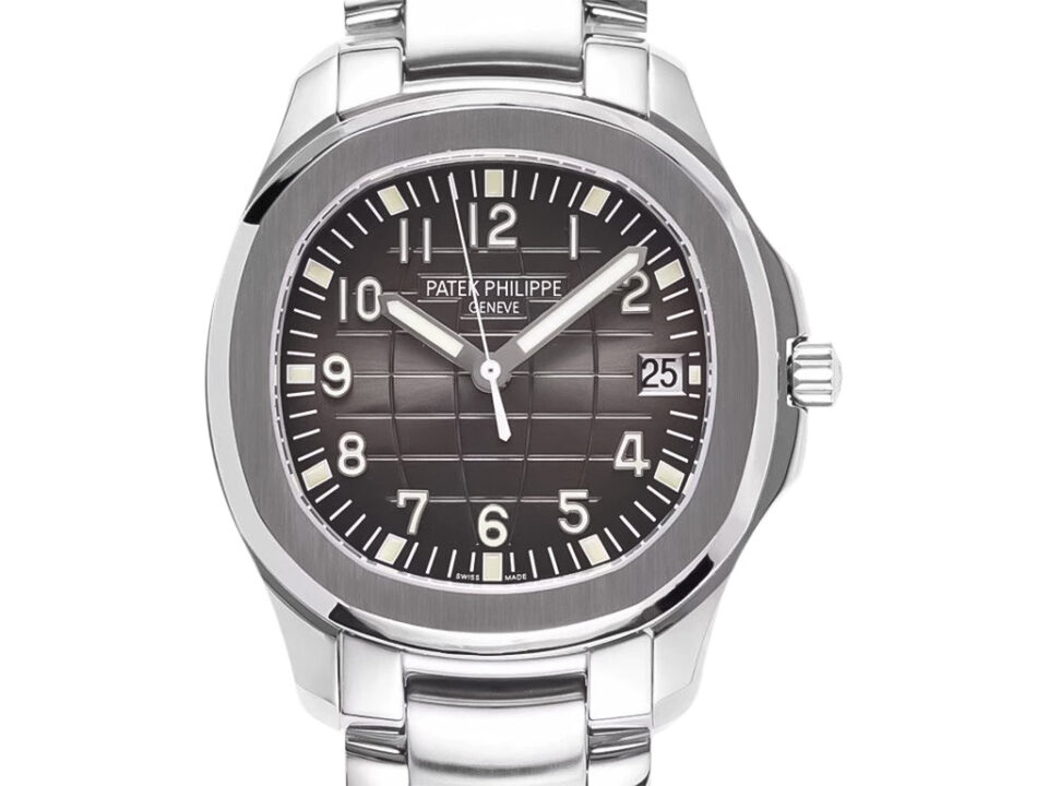 Aquanaut Date Stainless Steel watch (40mm) with rhodium dial, featuring a checkerboard pattern and date display at 3 o'clock.