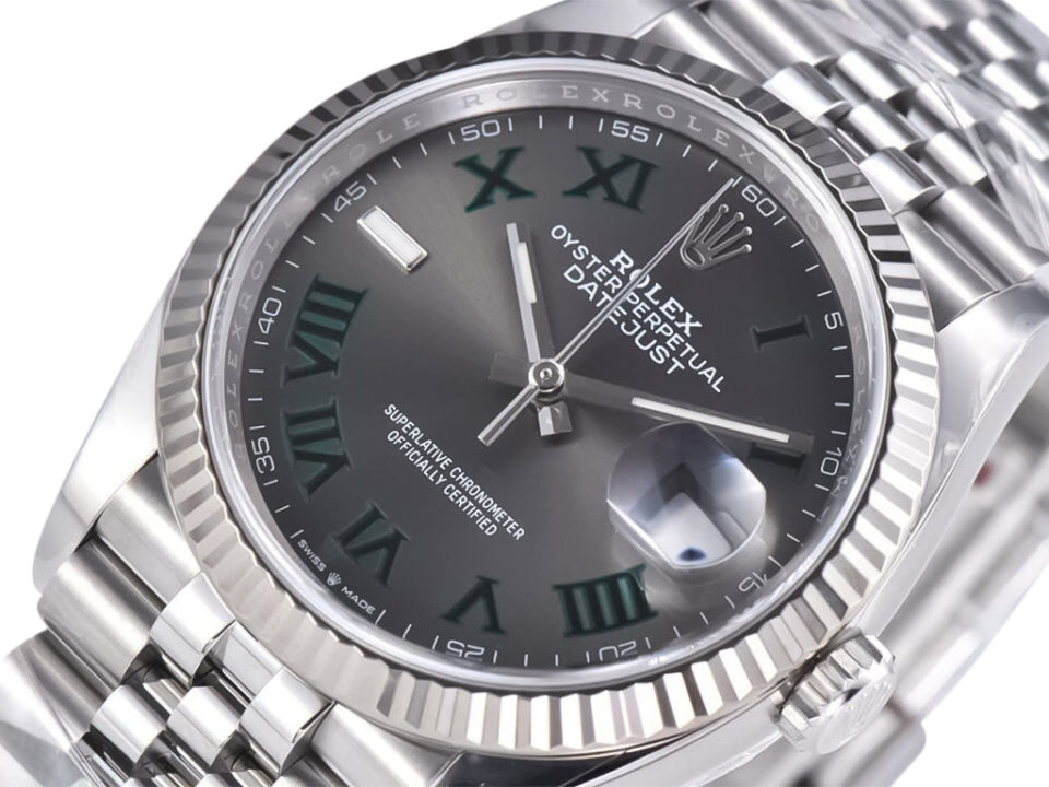 Datejust 36 Stainless Steel ‘Wimbledon’ on Jubilee with Fluted Bezel, dark dial, Roman numerals, date display at 3 o’clock.