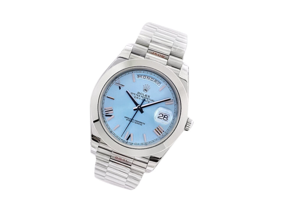 Day-Date 40 Platinum 'President' with ice blue dial, Roman numerals, smooth bezel, and platinum bracelet.