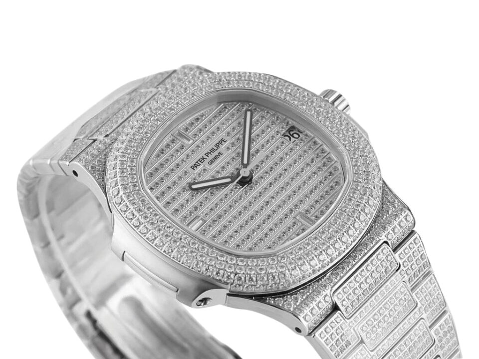 Nautilus Stainless Steel 'Iced Out' (40mm) watch with a diamond-encrusted bezel, dial, and bracelet displayed at an angle.