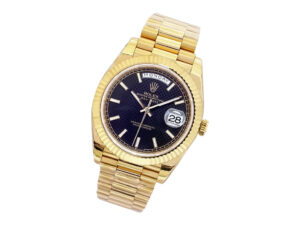 Day-Date 40 Yellow Gold ‘President’ watch with a black motif dial, fluted bezel, and gold bracelet showing Monday and 28.